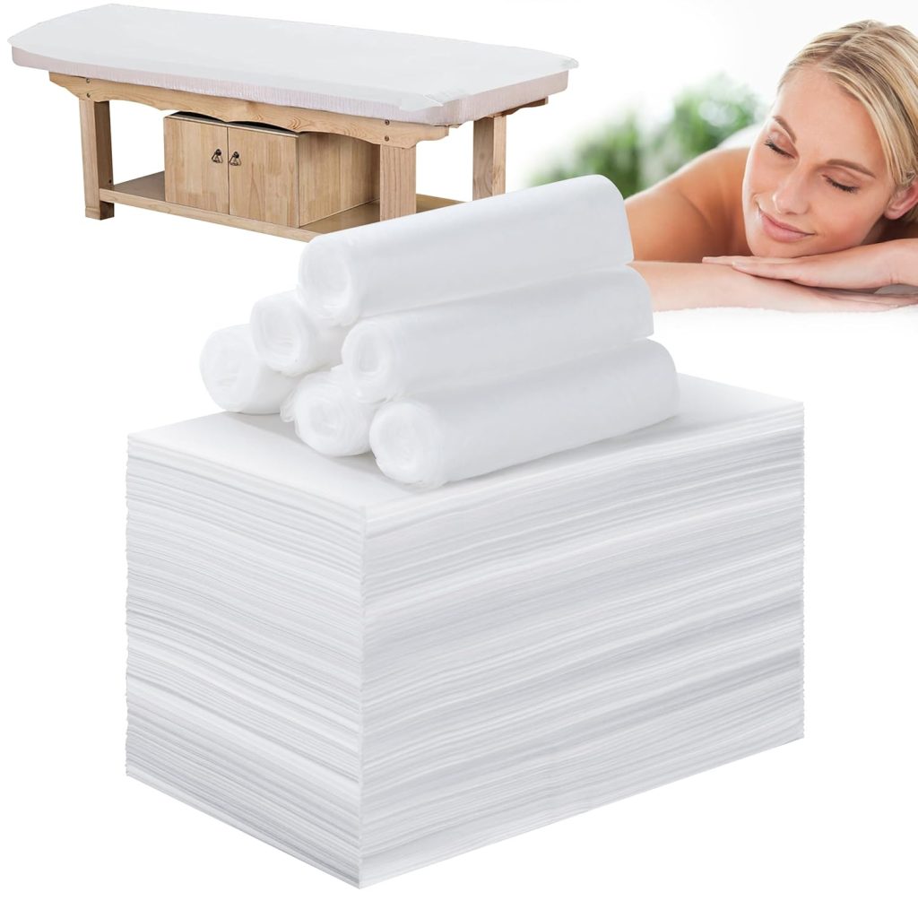 Stacked disposable towels for treatment beds