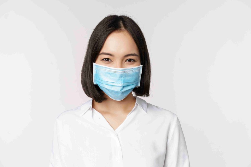 woman wearing a protective face mask